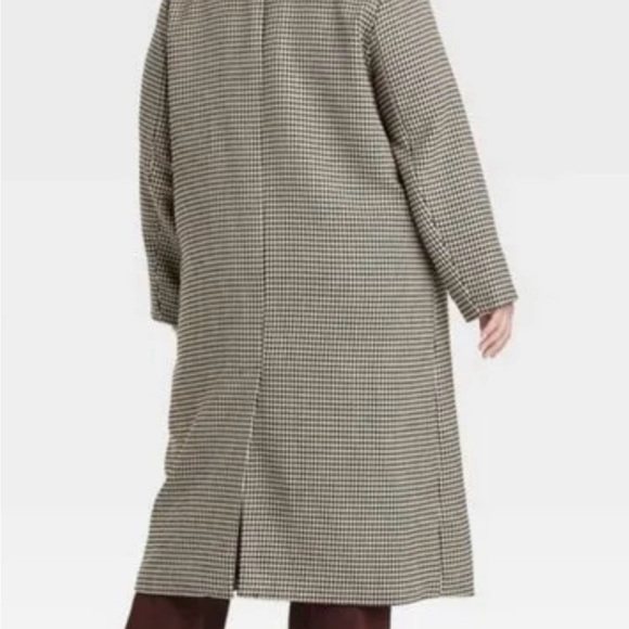 Houndstooth trench. Brand new (without tags) Never worn.
Women’s size L - Picture 2 of 4